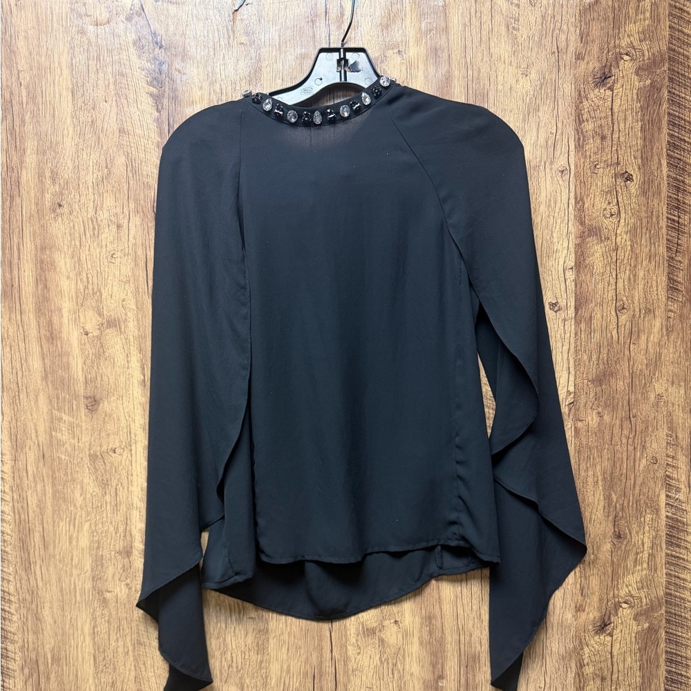 Chic Black Women's Blouse with Embellished Neckline